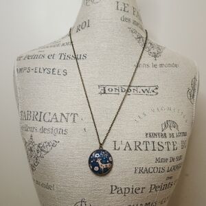 Reversible deer pendant necklace